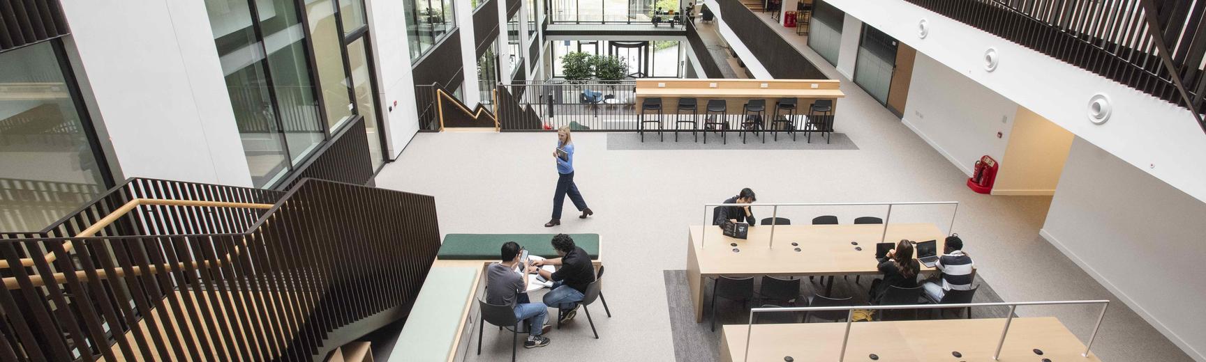interior of a modern people with people working in the atrium