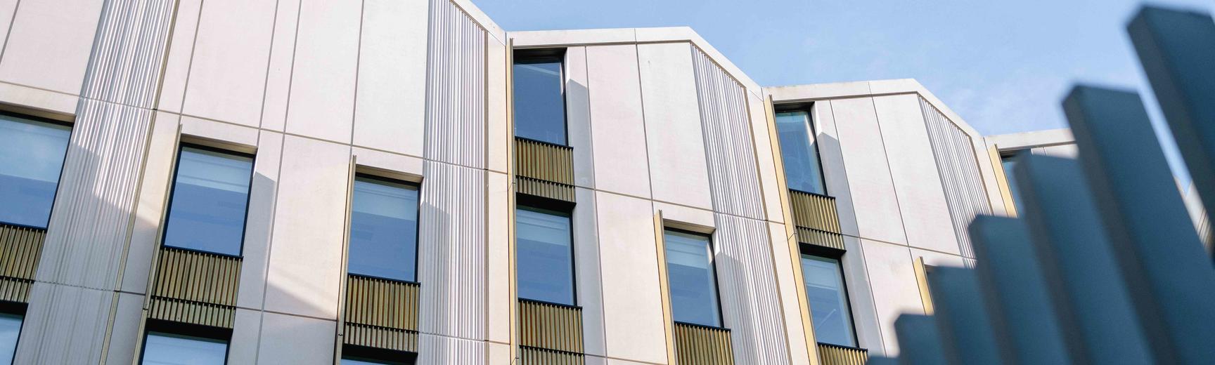 a modern building against a blue sky